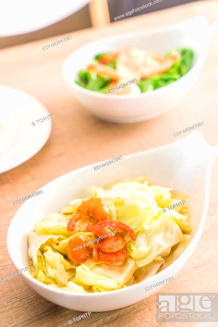 Stock Photo: Stir fried Cabbage with Fish sauce on plate.