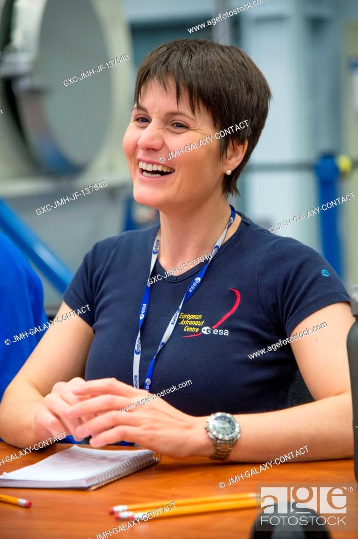 Stock Photo: European Space Agency astronaut Samantha Cristoforetti, Expedition 4243 flight engineer, enjoys a light moment during an emergency scenario training session in.