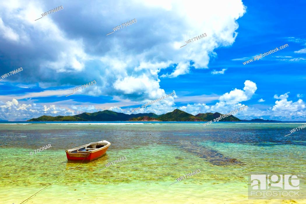 Stock Photo: Tropical island at Seychelles and boats.