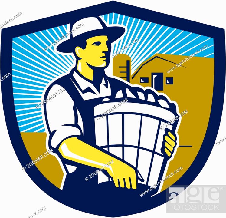 Stock Photo: Illustration of an organic farmer carrying basket of harvest crops looking to the side set inside shield crest with barn and sunburst in the background done in.