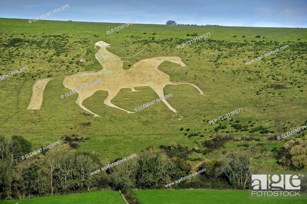 Stock Photo: The Osmington White Horse, hill figure of George III on horseback sculpted in 1808 into the limestone Osmington hill along the Jurassic Coast, Dorset.