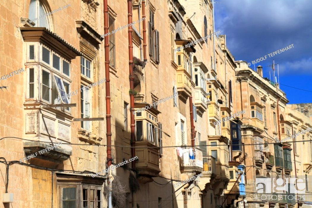 Stock Photo: Street with colorful balconies in historical part of Valletta, Malta.
