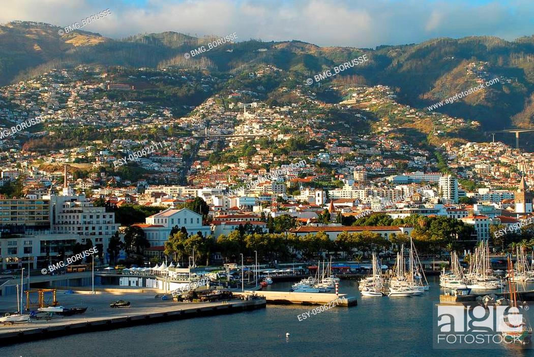 Stock Photo: Panoramic view of Funchal on Madeira Island. Portugal. Funchal is located inside a natural amphitheater-shaped valley, with gentle slopes beginning at the coast.