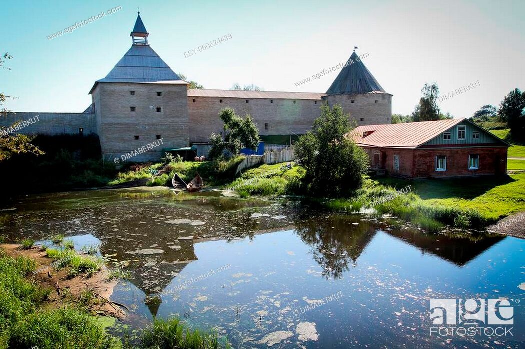 Stock Photo: Old stone fortress near the pond, in the North of Russia.