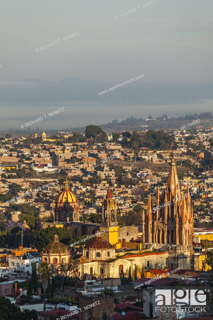 Stock Photo: The skyline and churches of San Miguel de Allende seen from scenic overlook.