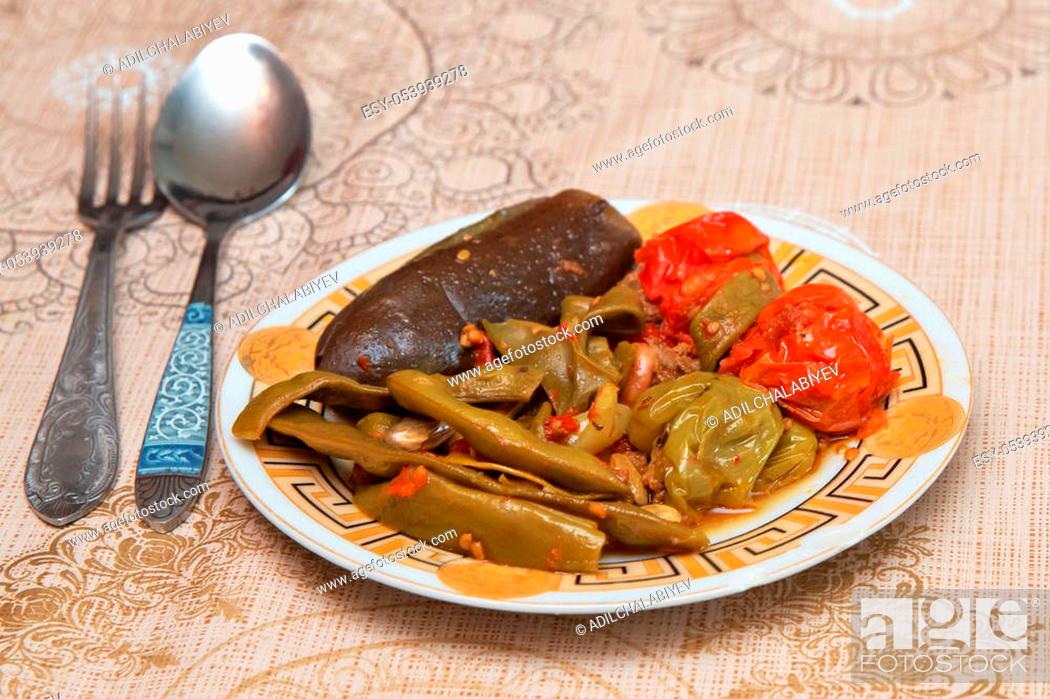Stock Photo: Erishde dish, eggplant stuffed dish and cucumber, tomato salad.