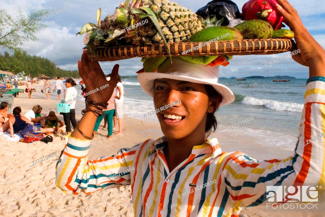 Stock Photo: Fruit sellers on the beach in Sihanoukville. Sihanoukville, it’s the 4th largest city in Cambodia but it’s really a beachside town, and it is incredible.