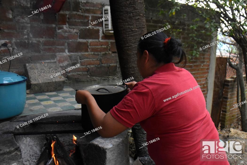 Stock Photo: TEPOZTLAN, MEXICO - JANUARY 16: The Housewife Isabel prepares 'Tamales' traditional Mexican food who are cooked in this season to celebrate the candlemas day.