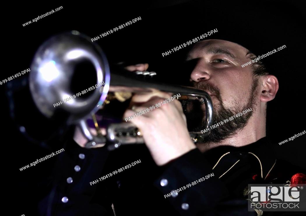 Stock Photo: 17 April 2019, Mexico, Mexiko-Stadt: Trumpeter Mauricio ""Don Mauro"" at his performance with the Franconian band ""Los Pistoleros Güeros"" in the Pulquería Las.