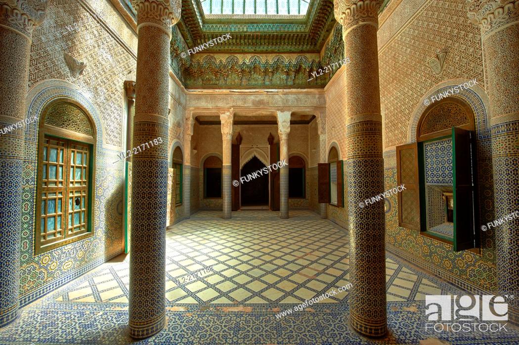 Stock Photo: Berber Muqarnas Arabesque stalactite plaster work ceiling and Mocarabe Honeycomb work plaster columns and capitals of the inner courtyard of the Kashah of.