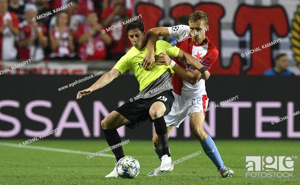 Stock Photo: From left MARIO RONDON of CFR and TOMAS SOUCEK of Slavia in action during the Football Champions' League 4th qualifying round return match: Slavia Prague vs.