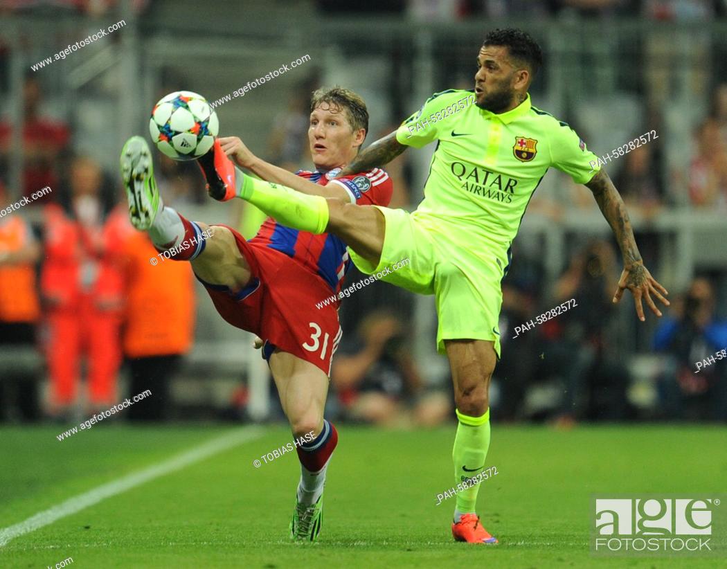 Stock Photo: Barcelona's Dani Alves and Bayern Munich's Bastian Schweinsteiger (l) in action during the Champions League semi final soccer match FC Bayern Munich vs FC.