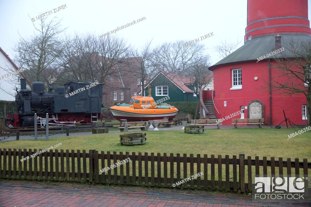 Stock Photo: Old lighthouse and Inselmuseum (museum) on Wangerooge, Germany, Lower Saxony, the North Sea, winter.
