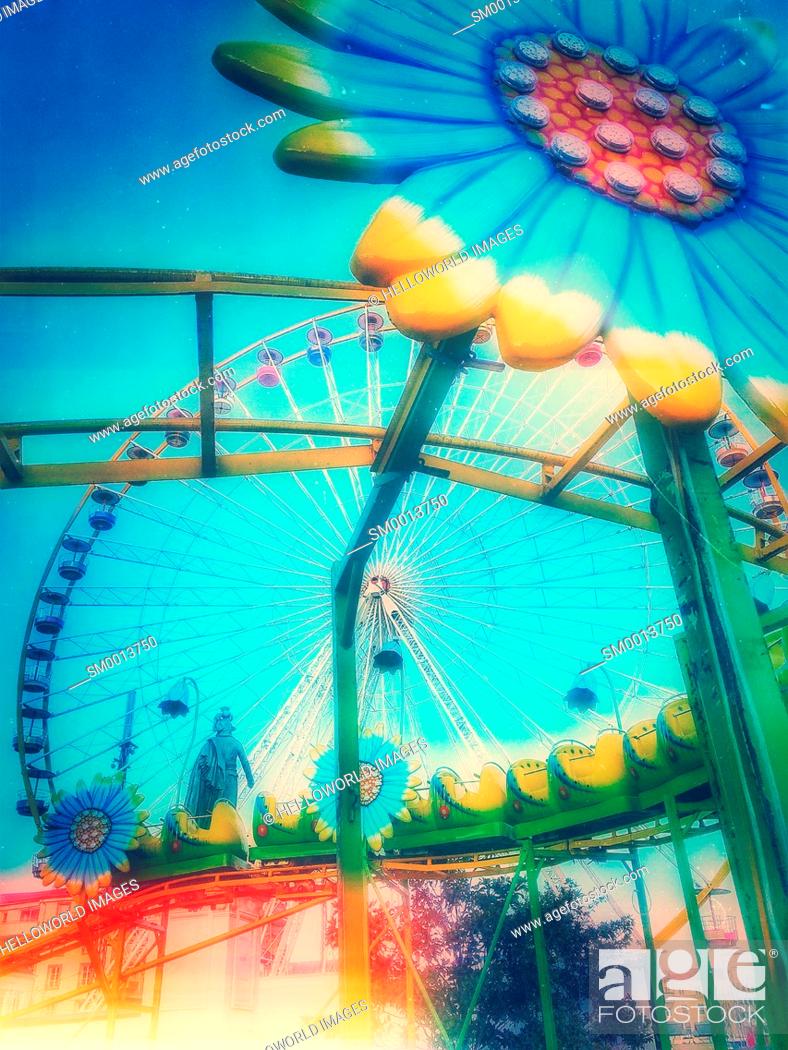 Stock Photo: Amusement park rides, Place Jaude, Clermont Ferrand, Auvergne, France.