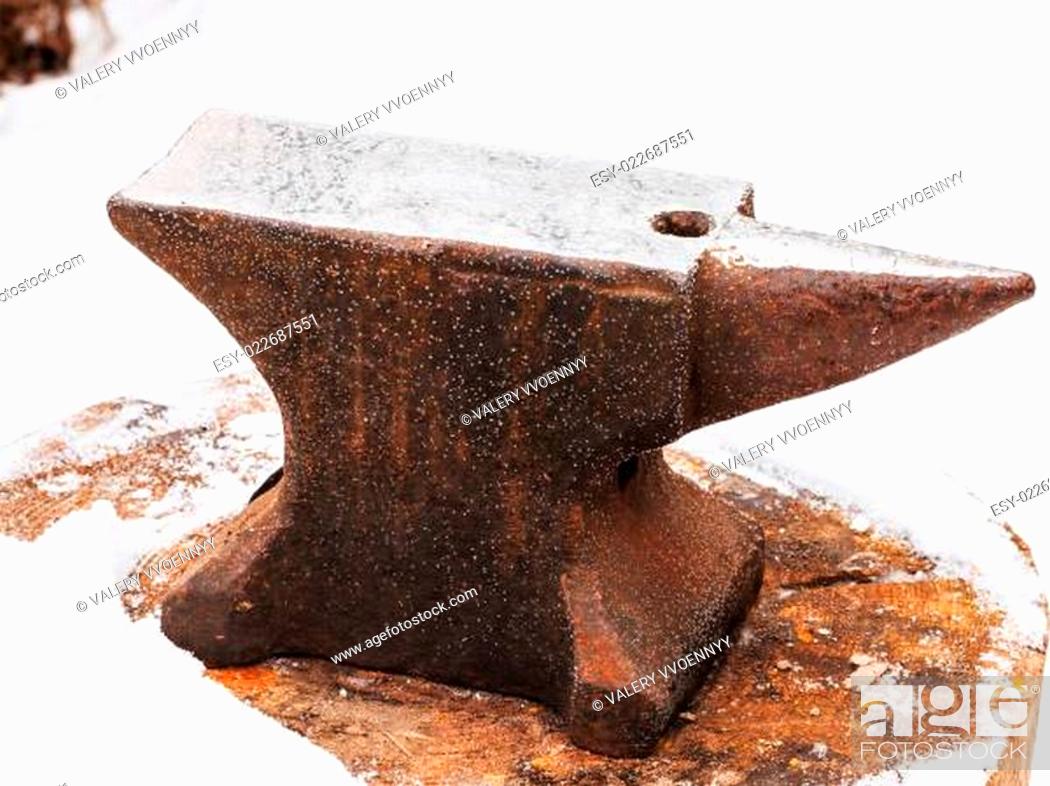 Stock Photo: anvil in old abandoned village smithy.