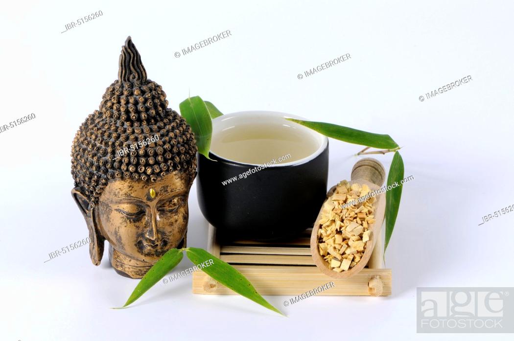Stock Photo: Cup of tea with stems of (Clematis) armandii (Caulis Clematidis Armandii), Mu Tong, Mutong Caulis.