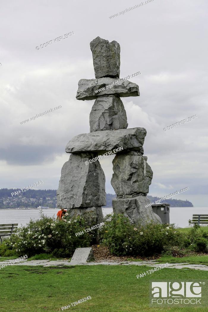 Stock Photo: 03.09.2014, Canada, Vancouver, stone symbol Inukshuk in English Bay, symbol of the Inuit and logo of the Winter Olympics in Vancouver, stone sculpture, stones.