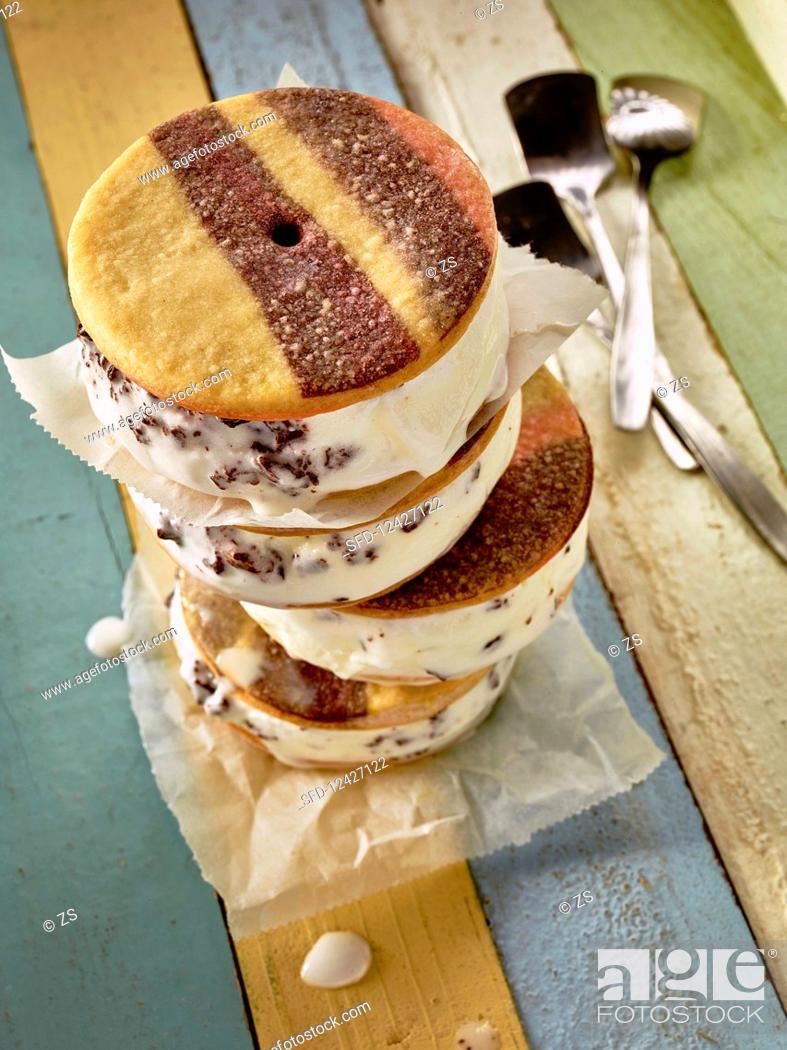 Stock Photo: Colourful stracciatella ice cream sandwiches.