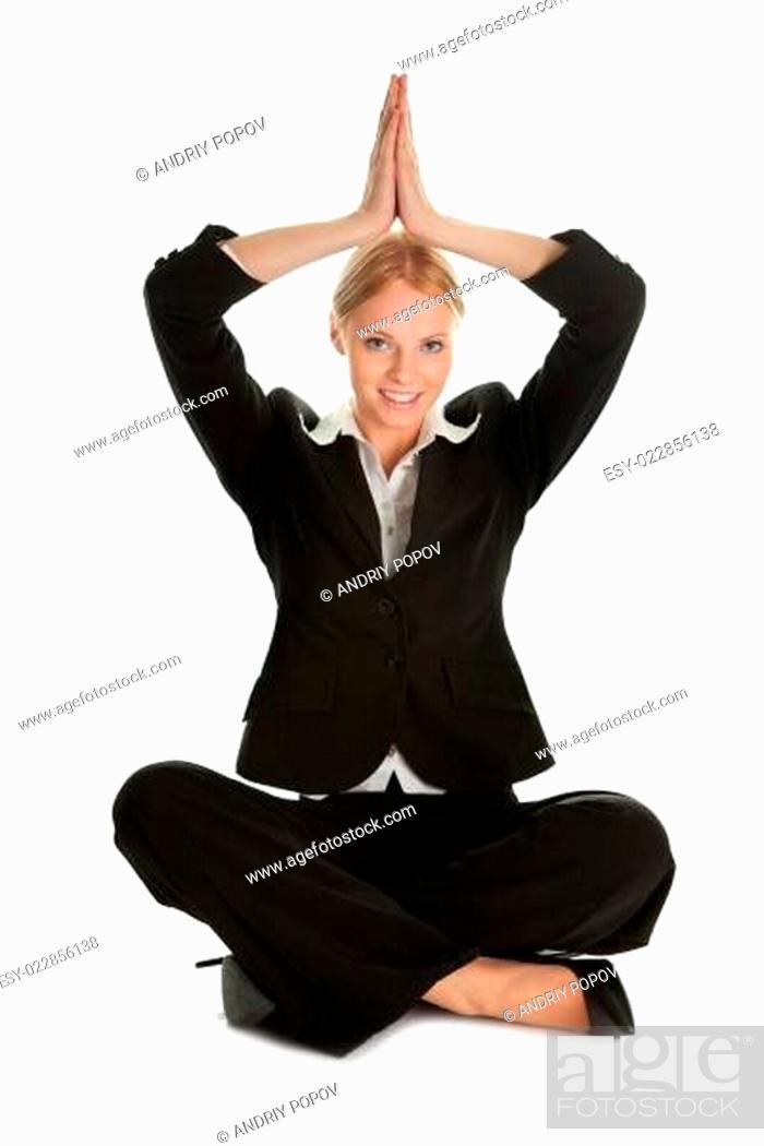 Stock Photo: Businesswoman sitting in lotus flower position.