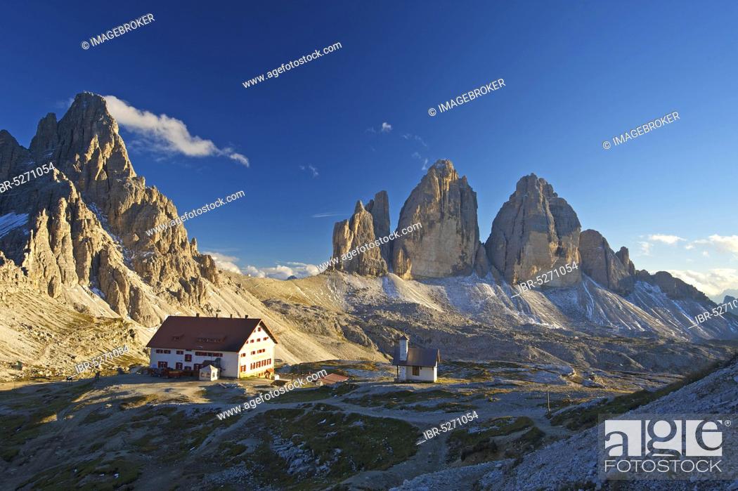 Stock Photo: Three Peaks Hut and Chapel in front of Parternkofel and north faces of the Three Peaks, Sesto Dolomites, Trentino-South Tyrol, Italy, Europe.