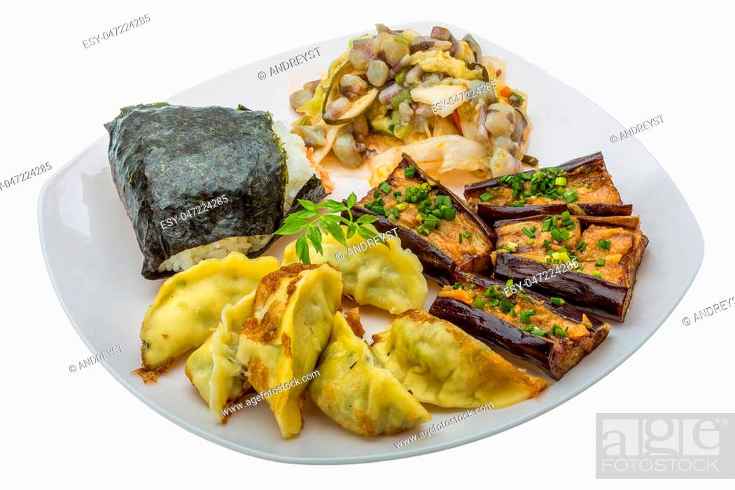 Stock Photo: Japan traditional food - rice ball, gyoza, eggplant and octopus salad.