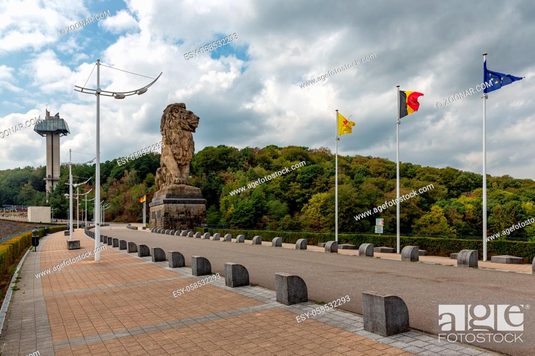 Stock Photo: Gileppe dam in Belgium with pathway, watch-tower and monumental Lion.