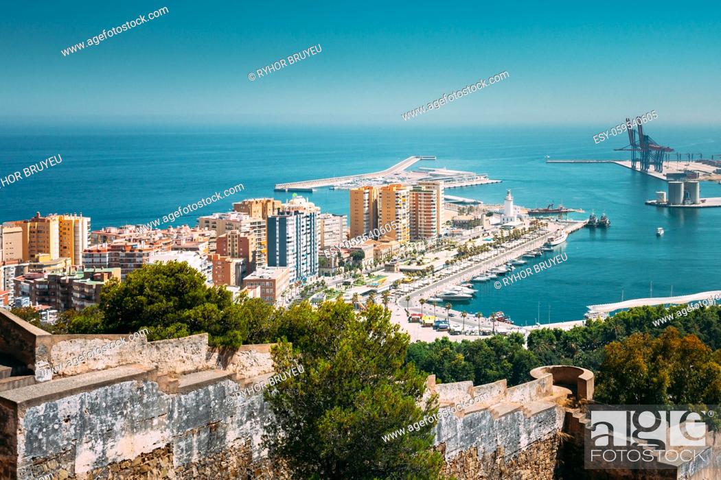 Stock Photo: Malaga, Spain. Elevated View, Cityscape View Of Malaga, Spain. Old Fort Walls And Residential Houses.