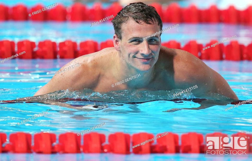 Stock Photo: Ryan Lochte of USA smiles after men's 200m individual medley preliminaries of the 15th FINA Swimming World Championships at Palau Sant Jordi Arena in Barcelona.