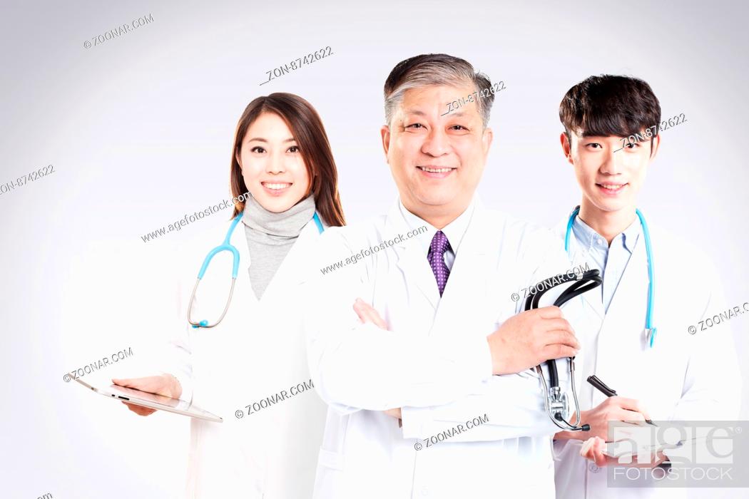 Photo de stock: three Asian surgery doctors in hospital.