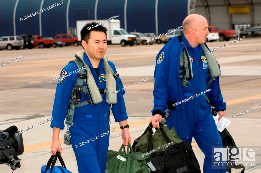 Stock Photo: Astronauts Mark E. Kelly (right), STS-124 commander; and Akihiko Hoshide, mission specialist representing the Japan Aerospace Exploration Agency (JAXA).