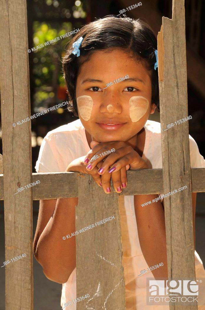 Stock Photo: Girl with thanaka paste on her face, Burmese make-up, a village near Bagan, Myanmar, Burma, Southeast Asia, Asia.