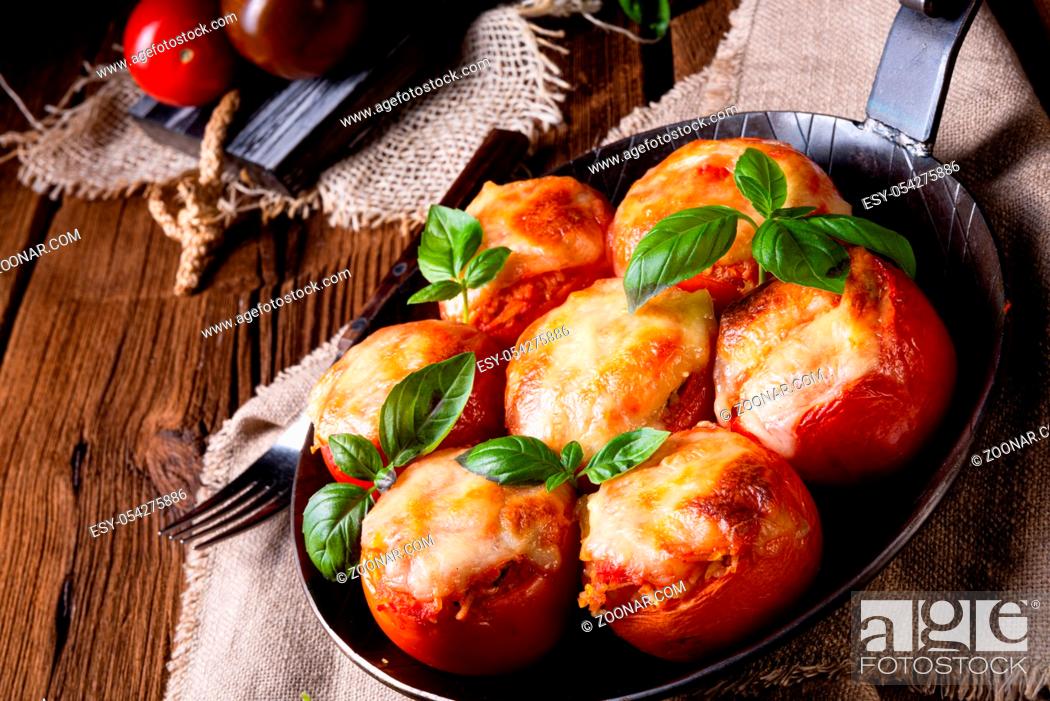 Stock Photo: Stuffed tomatoes with minced meat and cheese.