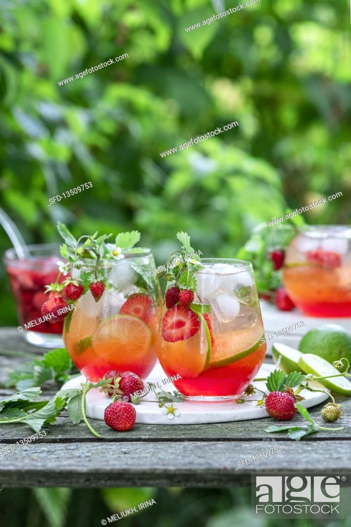Stock Photo: Strawberry lemonade with limes.