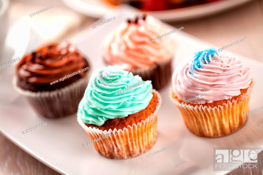 Stock Photo: Selection of Colored Cupcakes. High photo quality.