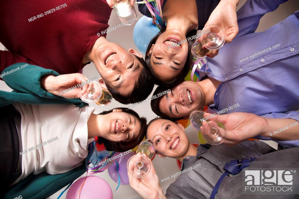 Stock Photo: Business Colleagues Celebrating With Champagne.
