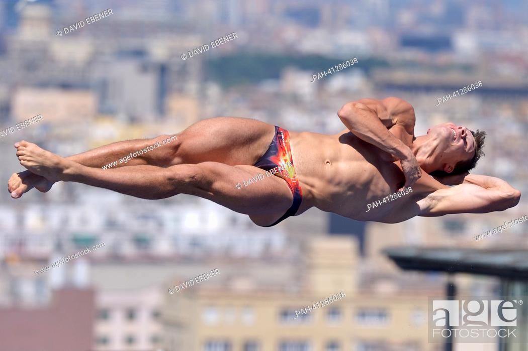 Stock Photo: Patrick Hausding of Germany in action during the men's 3m Springboard diving semifinal of the 15th FINA Swimming World Championships at Montjuic Municipal Pool.