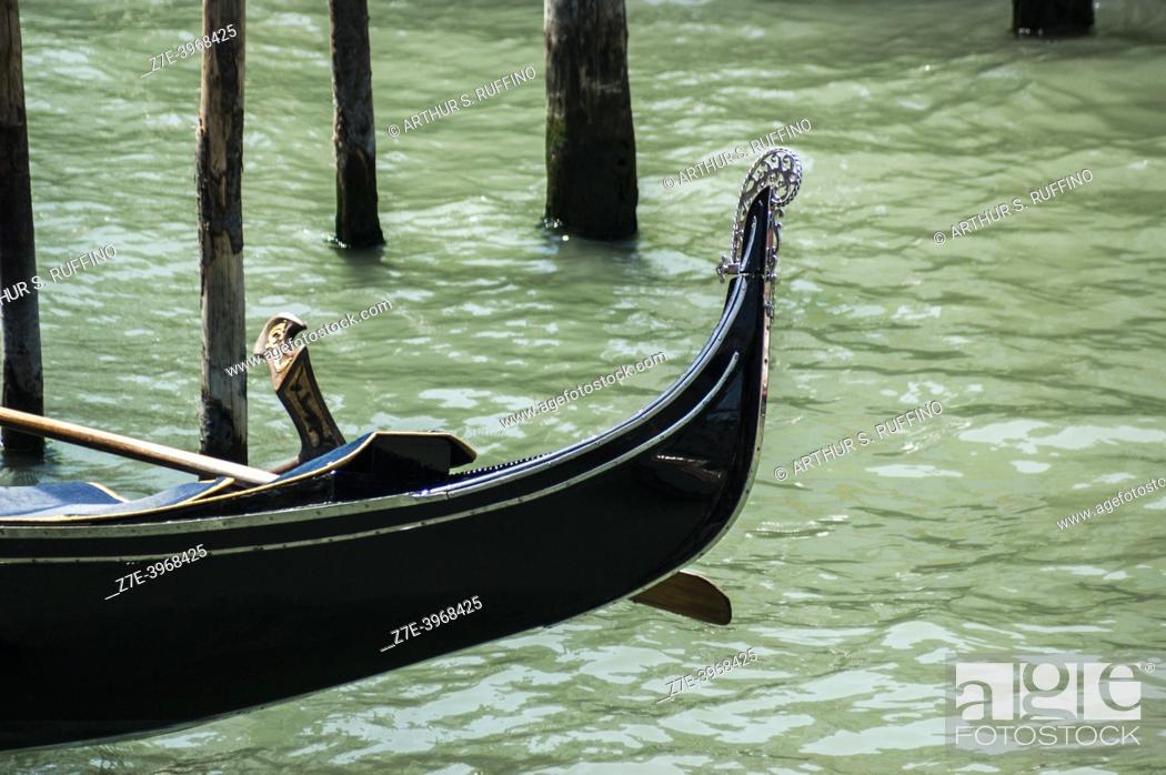 Stock Photo: Partial view of a moored gondola in canal. Venice, Veneto Region, Italy, Europe.
