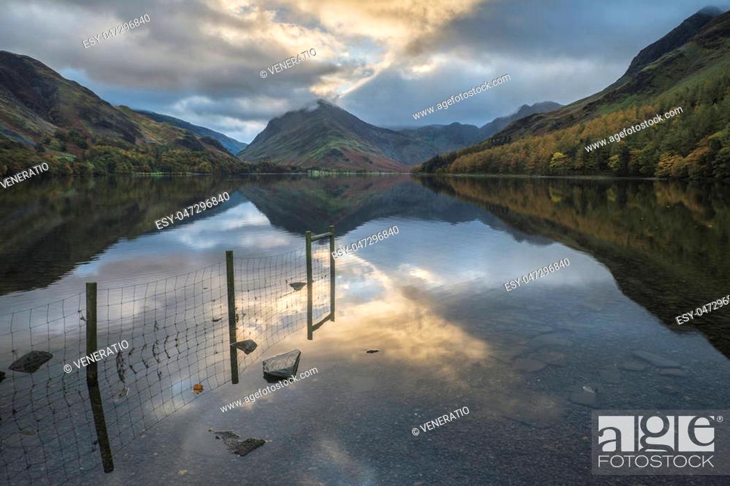 Stock Photo: Stunning Autumn Fall landscape image of Lake Buttermere in Lake District England.