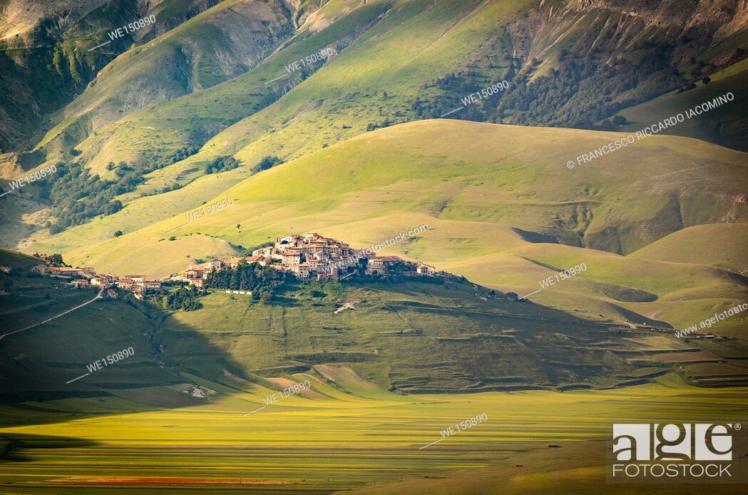 Stock Photo: Castelluccio di Norcia, Umbria, Italy. View of the town from the valley.