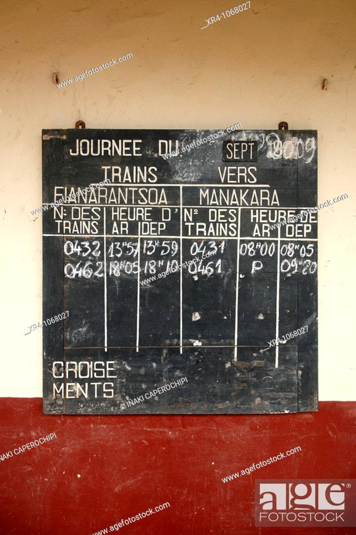 Stock Photo: Panel on train schedules, Madagascar FCE Jungle Express, Sahambavy train station, Sahambavy,  Fianarantsoa, Madagascar, Africa.
