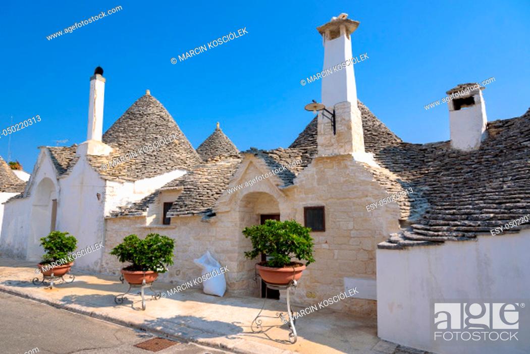 Stock Photo: Famous trulli houses in Alerbobello town, Apulia, Italy.