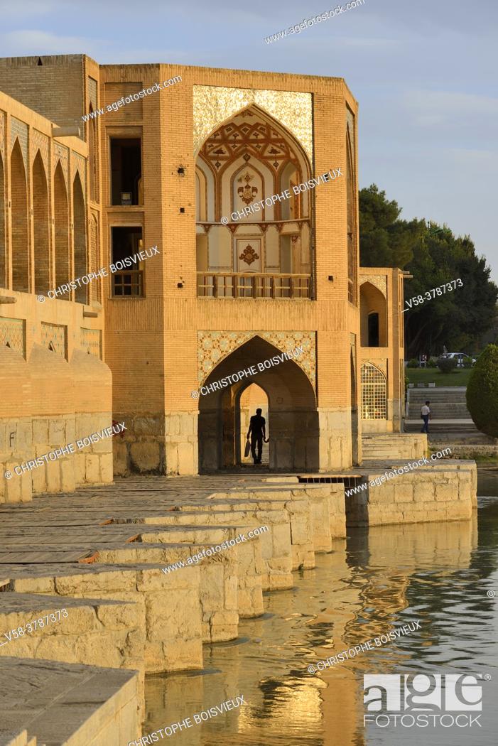 Stock Photo: Iran, Isfahan, World Heritage Site, Khaju bridge and Zayandeh river.