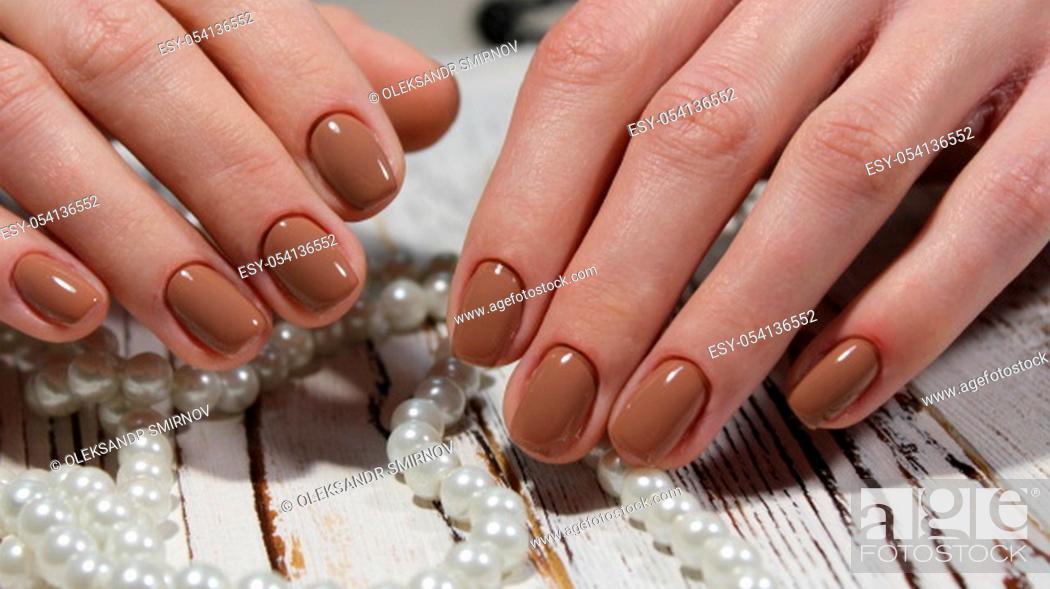 Hands with beautiful manicure. Natural nails with gel polish, Stock Photo,  Picture And Low Budget Royalty Free Image. Pic. ESY-054136552 | agefotostock