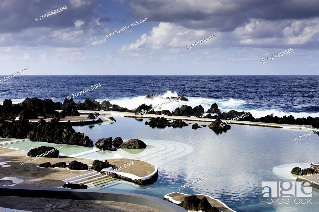 Stock Photo: Natural pools in Porto Moniz with lava rocks and atlantic ocean as background on Madeira, Portugal.