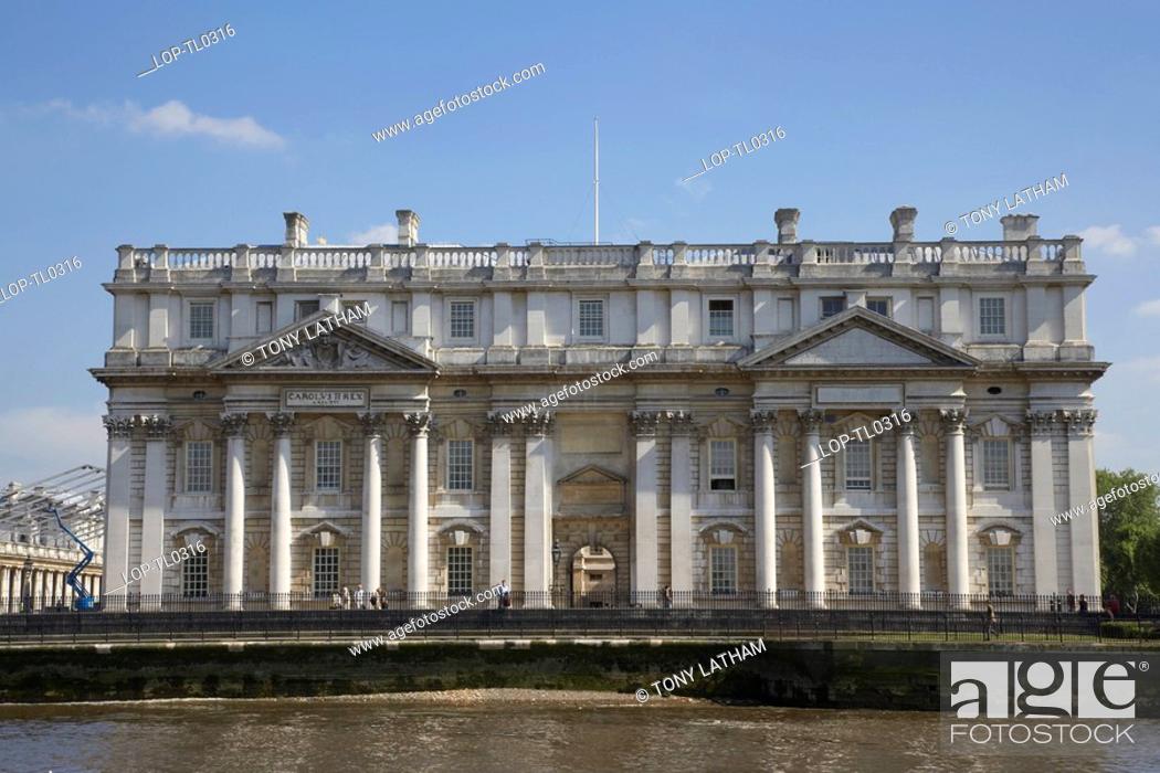 Stock Photo: England, London, Greenwich, A view across the River Thames of a traditional navel building in Greenwich.