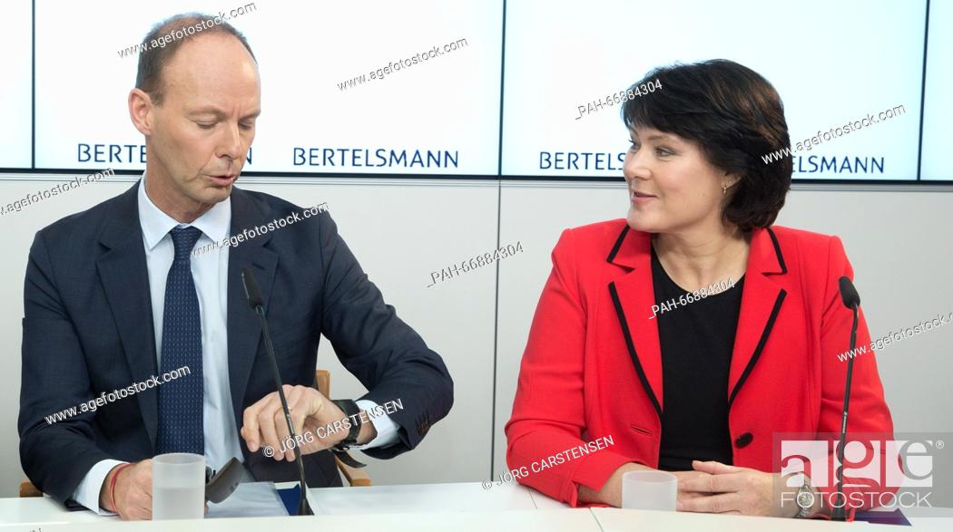 Stock Photo: Bertelsmann SE CEO Thomas Rabe (L) sits next to Anke Schaeferkordt, board member and general manager of the media group RTL Germany.