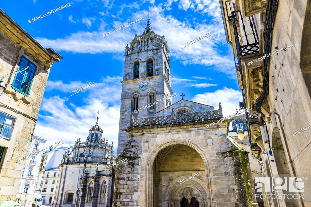 Stock Photo: North gate under a gothic porch of the Cathedral of Lugo, seen from the street Obispo Basulto. Saint Mary's Cathedral, Catedral de Santa María.