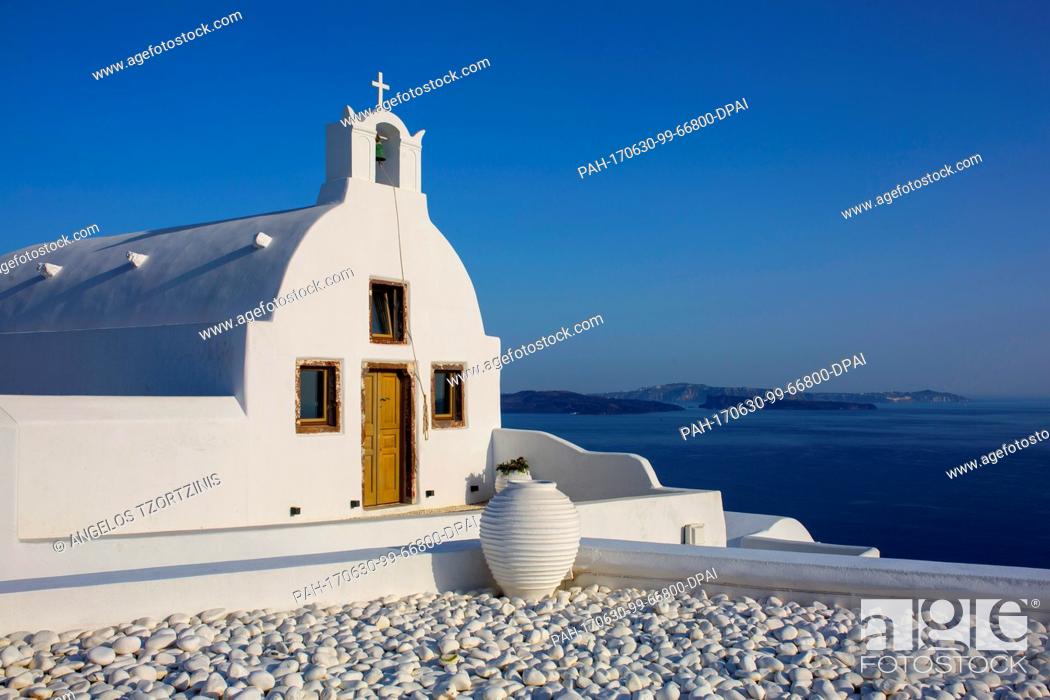 Stock Photo: Picture of a chapel in Oia in the island of Santorini, Greece, taken 29 June 2017. A heat wave with temperatures of up to 43 degrees Celsius has hit Greece.