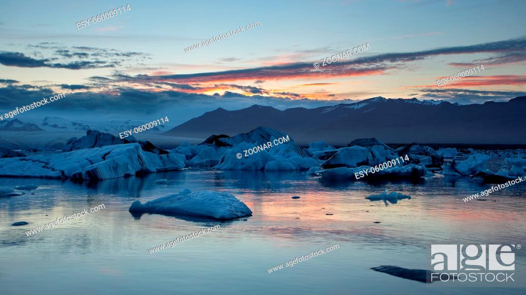Stock Photo: Jokulsarlon, glacier lagoon in Iceland at night with ice floating in water. Cold arctic nature landscape scenery. Ice melting.
