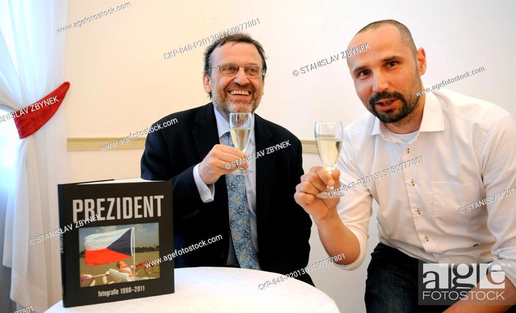 Stock Photo: The Czech News Agency CEO Jiri Majstr (left) and CTK Photobank Editor in Chief Petr Mlch present the book President (Prezident) of photos of late Czech.